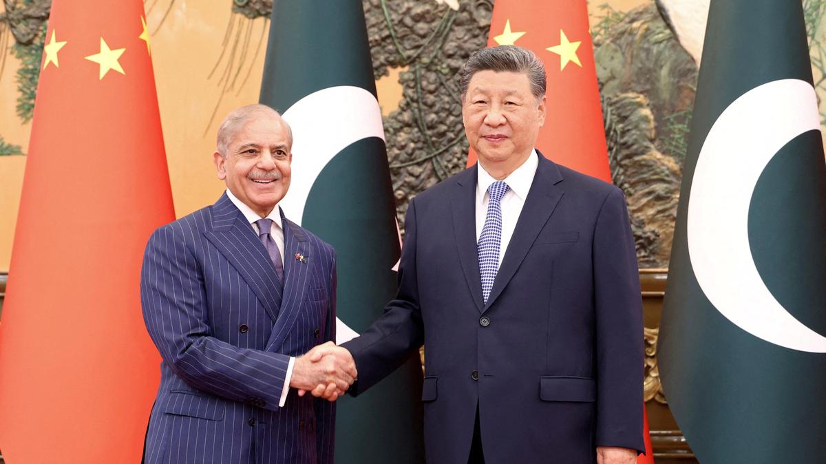Chinese President Xi Jinping and Pakistani Prime Minister Shehbaz Sharif shake hands at the Great Hall of the People in Beijing, China May 25, 2026.  China Daily via REUTERS