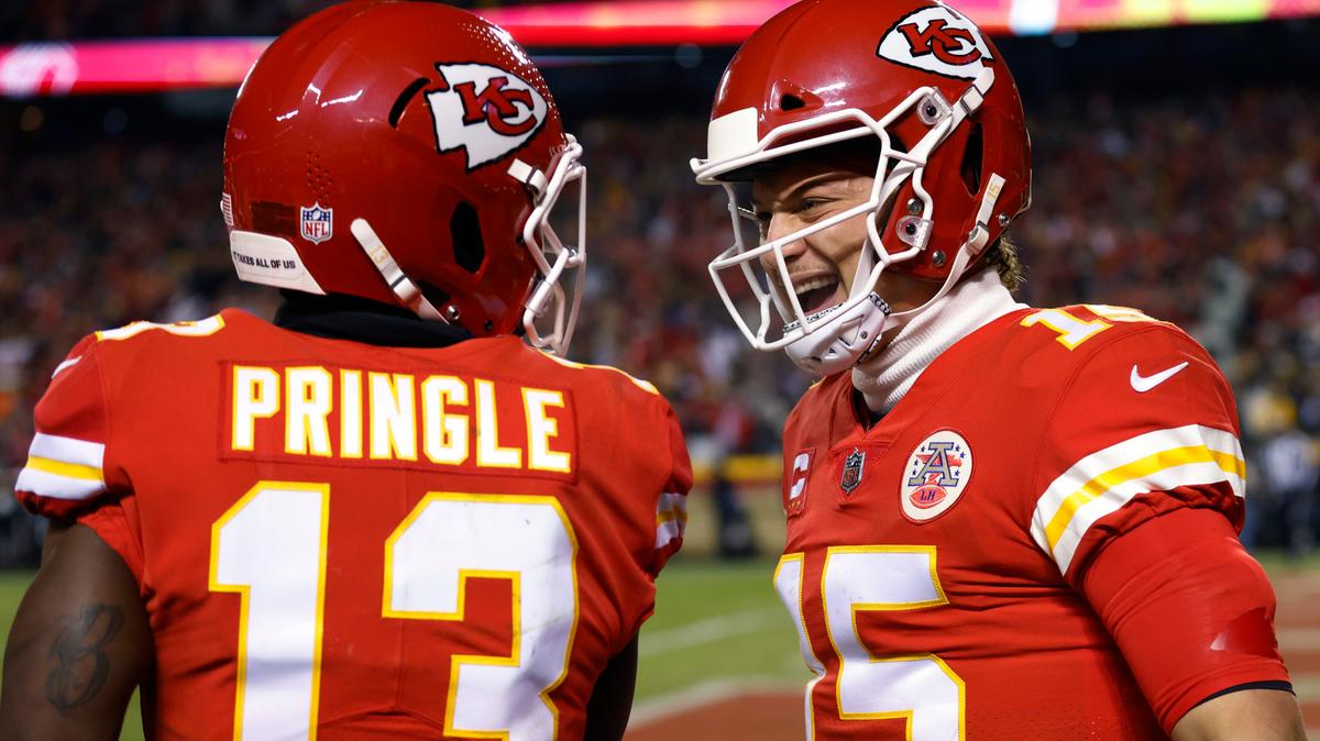 Kansas City Chiefs wide receiver Byron Pringle (13) celebrates with teammate quarterback Patrick Mahomes (15) after catching a 12-yard touchdown pass during the first half of an NFL wild-card playoff football game against the Pittsburgh Steelers, Sunday, Jan. 16, 2022, in Kansas City, Mo. (AP Photo/Colin E. Braley)