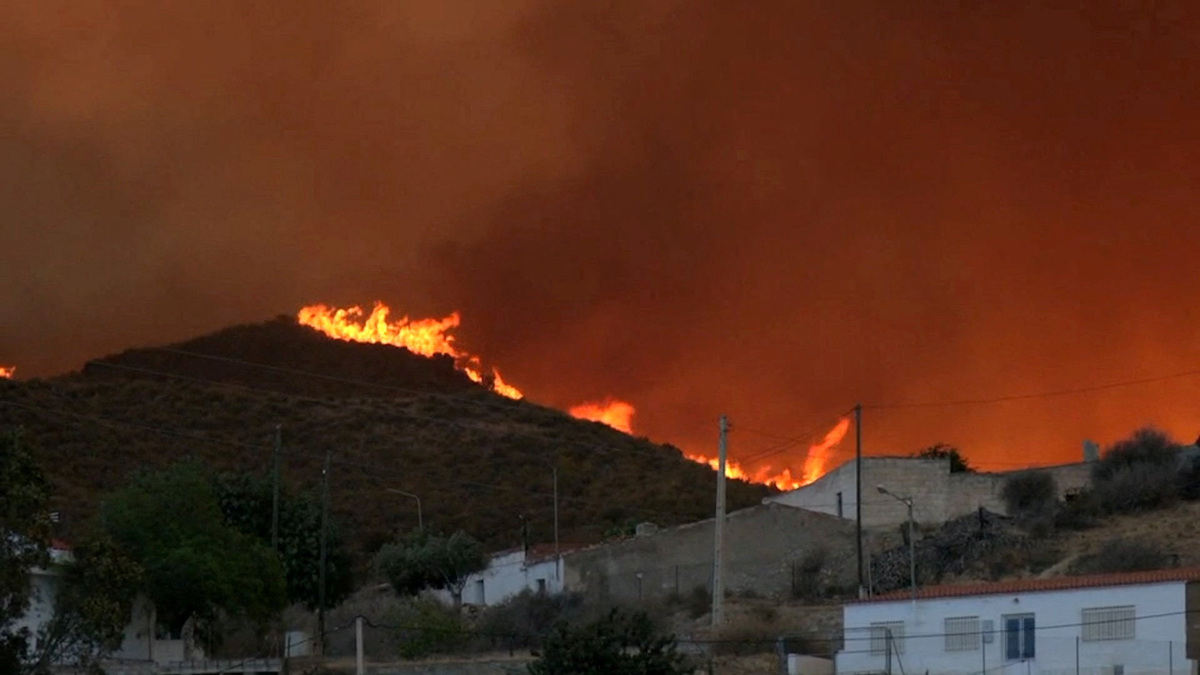 Smoke and flames rise during a wildfire in Los Gallardos, Spain, July 9, 2026 in this screengrab taken from a handout video. Forta/Handout via REUTERS