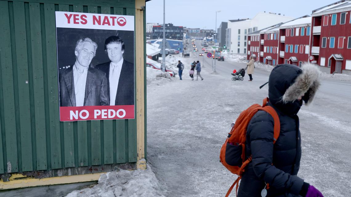A poster at a bus stop that shows U.S. President Donald Trump with pedophile and human trafficker Jeffrey Epstein reads: "Yes NATO, No Pedo" three days after U.S. President Donald Trump walked back on his most aggressive threats over acquiring Greenland on Jan. 24, 2026, in Nuuk, Greenland. In his speech at the World Economic Forum in Davos Trump said he would not use force to acquire Greenland. Following a subsequent meeting with NATO Secretary General Mark Rutte he also cancelled his threat of punitive tariffs against several European countries. Instead Trump said he sees a new "framework" on a deal as likely workable. (Sean Gallup/Getty Images/TNS)