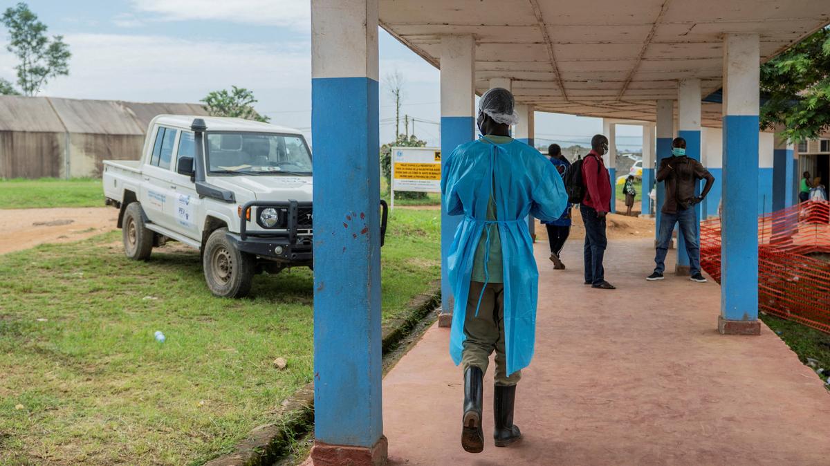 A healthcare worker walks at the Bunia General Referral Hospital following a resurgence of Ebola involving the Bundibugyo strain, a rarer variant of the virus with no approved vaccine currently available, in Bunia, Ituri province of the Democratic Republic of Congo May 21, 2026. REUTERS/Stringer