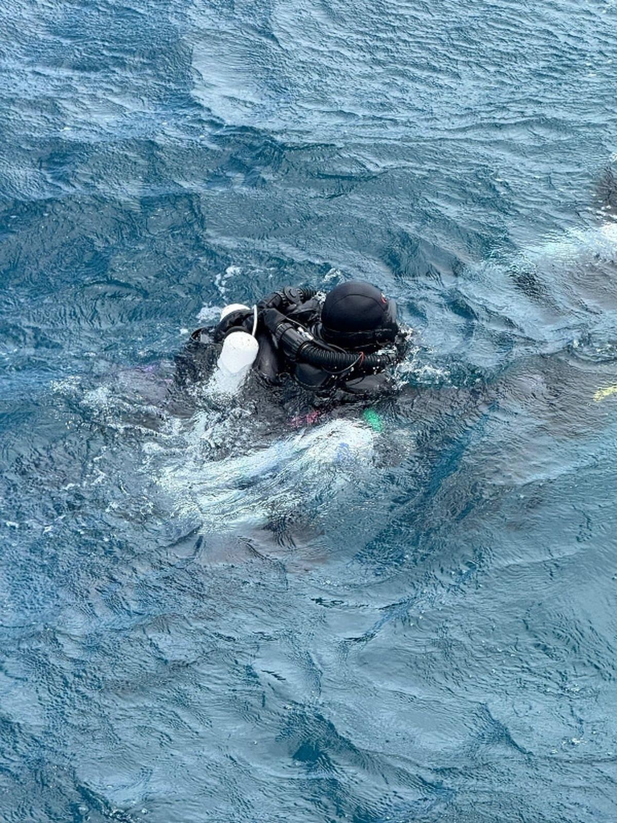 A diver from Finland takes part in a recovery operation for four missing Italian scuba divers who died in an accident in underwater caves near Vaavu Atoll, Maldives, in this handout photo released on May 19, 2026. Maldives President’s Office/ Handout via REUTERS