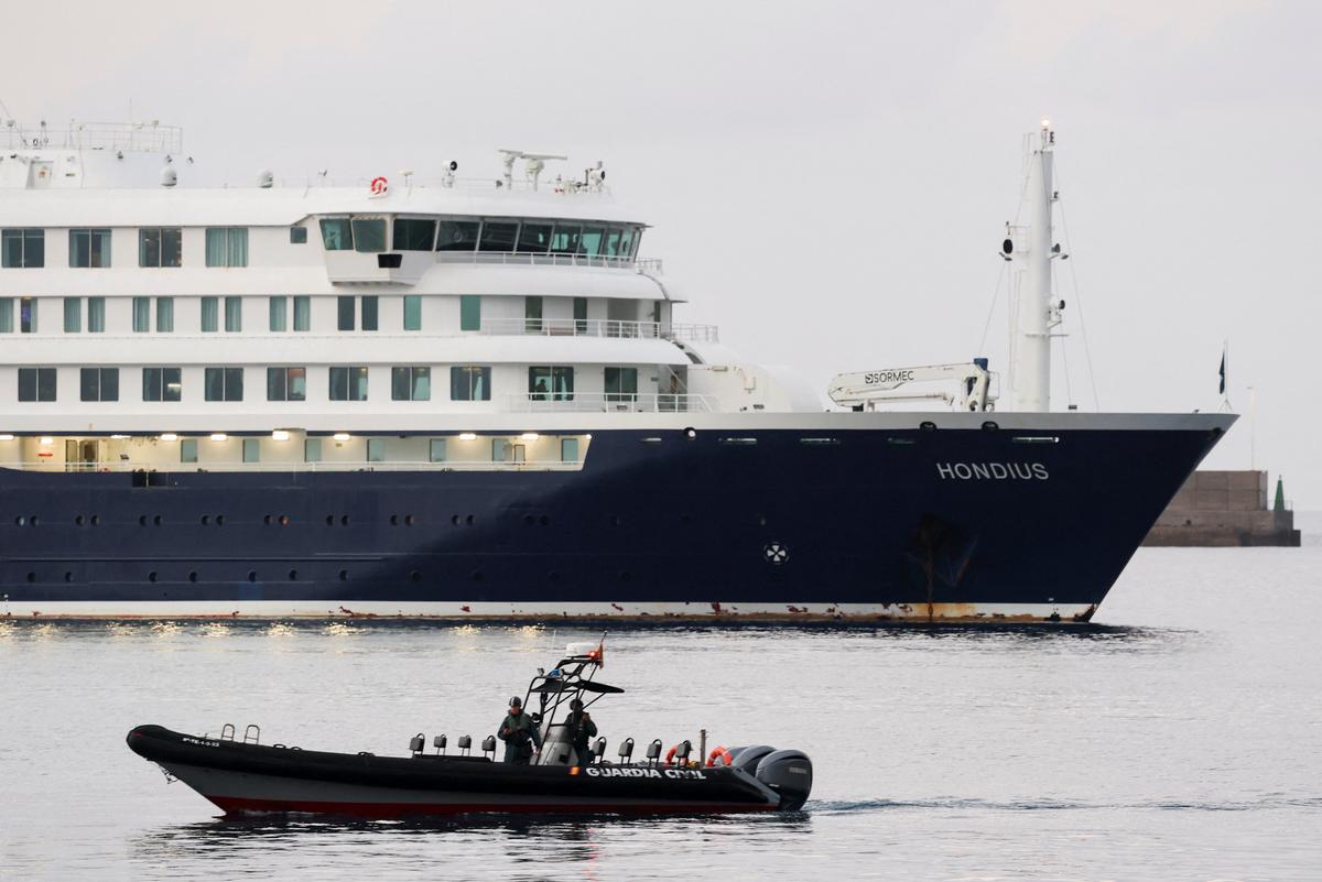 A police boat operates next to the cruise ship MV Hondius at the port of Granadilla de Abona after being affected by a hantavirus outbreak, in Tenerife, Spain, May 10, 2026. REUTERS/Hannah McKay