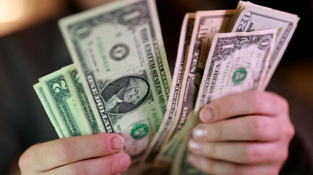 U.S. dollar banknotes are seen in this illustration taken March 24, 2026. REUTERS/Dado Ruvic/Illustration