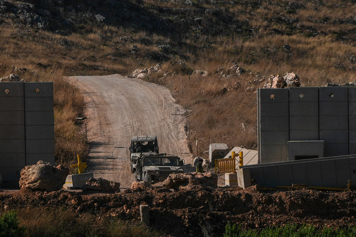Israeli military vehicles at the Israel-Lebanon border, as seen from the Israeli side, June 8, 2026. REUTERS/Ayal Margolin