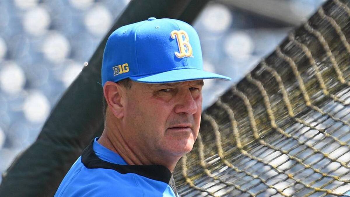  Jun 14, 2025; Omaha, Neb, USA; UCLA Bruins head coach John Savage watches the team warm up before the game against the Murray State Races at Charles Schwab Field. Mandatory Credit: Steven Branscombe-Imagn Images | Steven Branscombe-Imagn Images 