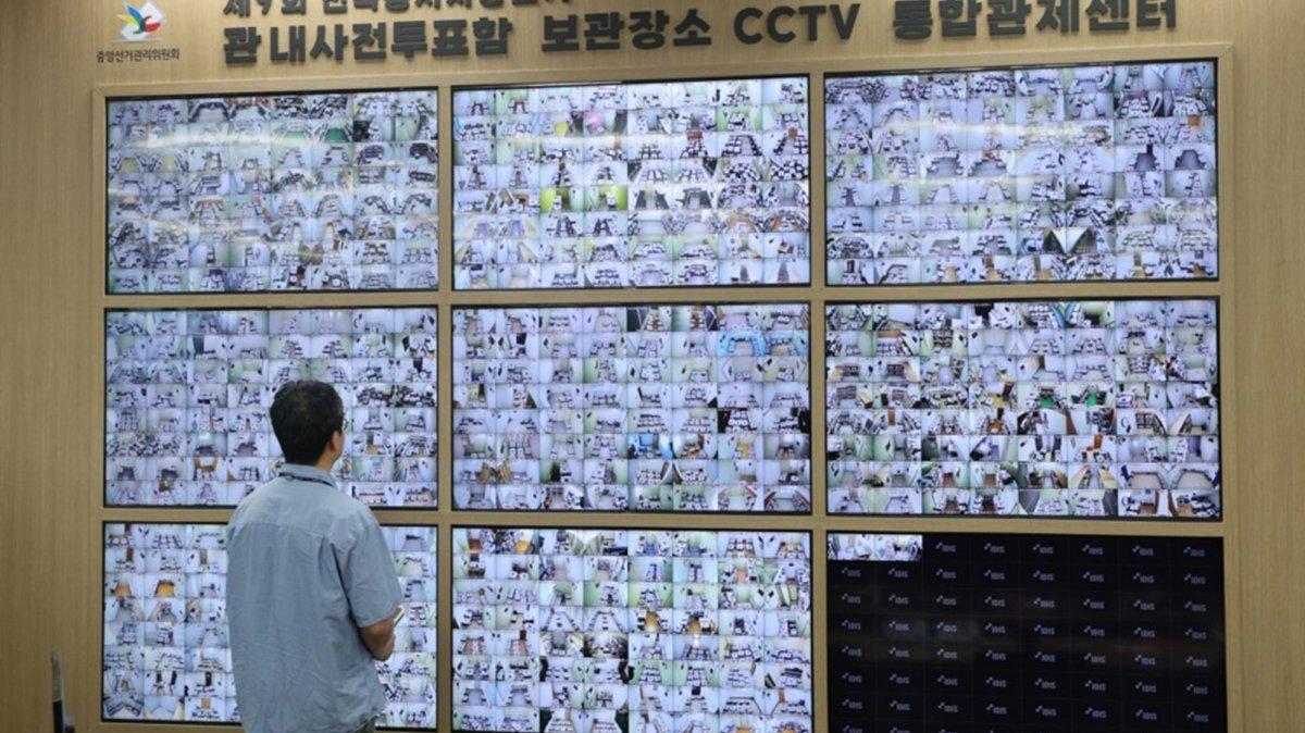 An official at the National Election Commission looks at monitors showing CCTV screens installed at locations storing ballot boxes from early voting, in Gwacheon, South Korea, 31 May 2026, as the country is set to hold nationwide regional elections and parliamentary by-elections on 03 June. Photo by YONHAP / EPA
