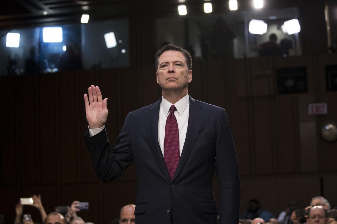 FILE -- Former FBI Director James Comey is sworn in during a Senate hearing on Capitol Hill in Washington, June 8, 2017. The Justice Department has secured a new indictment of Comey over a social media post, after a past indictment effort spurred by President Trump in 2025 ended in failure, according to people familiar with the investigation. (Doug Mills/The New York Times)