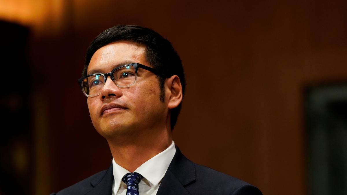 FILE PHOTO: Dale Ho, a voting rights advocate with the ACLU nominated to become a federal district court judge in Manhattan, prepares to give his opening statement during a U.S. Senate Judiciary Committee hearing on Capitol Hill in Washington, U.S., December 1, 2021. REUTERS/Elizabeth Frantz/File Photo