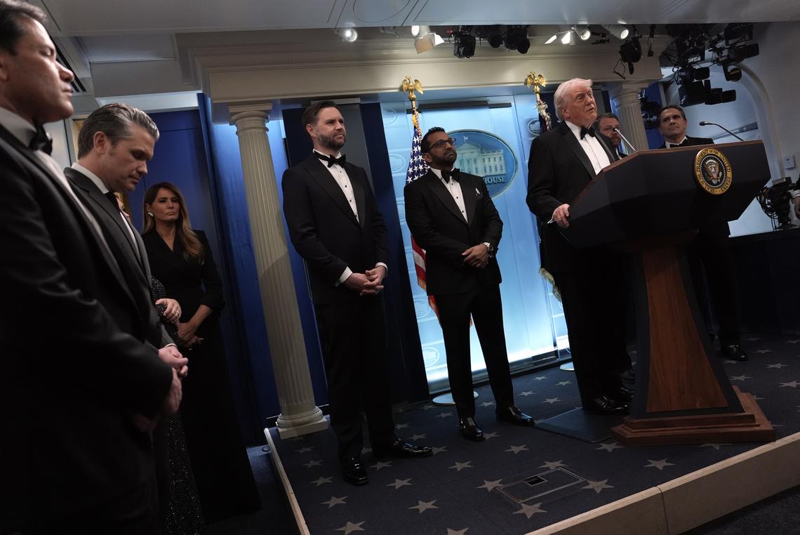 Cabinet secretaries and others look on as President Donald Trump briefs reporters at the White House after shots were fired during the White House Correspondents' Association dinner at the Washington Hilton in Washington on Saturday, April 25, 2026. From left: Secretary of State and National Security Advisor Marco Rubio; Defense Secretary Pete Hegseth; Melania Trump, the first lady; Vice President JD Vance; FBI Director Kash Patel; Homeland Security Secretary Markwayne Mullin; and Acting Attorney General Todd Blanche. (Salwan Georges/The New York Times)