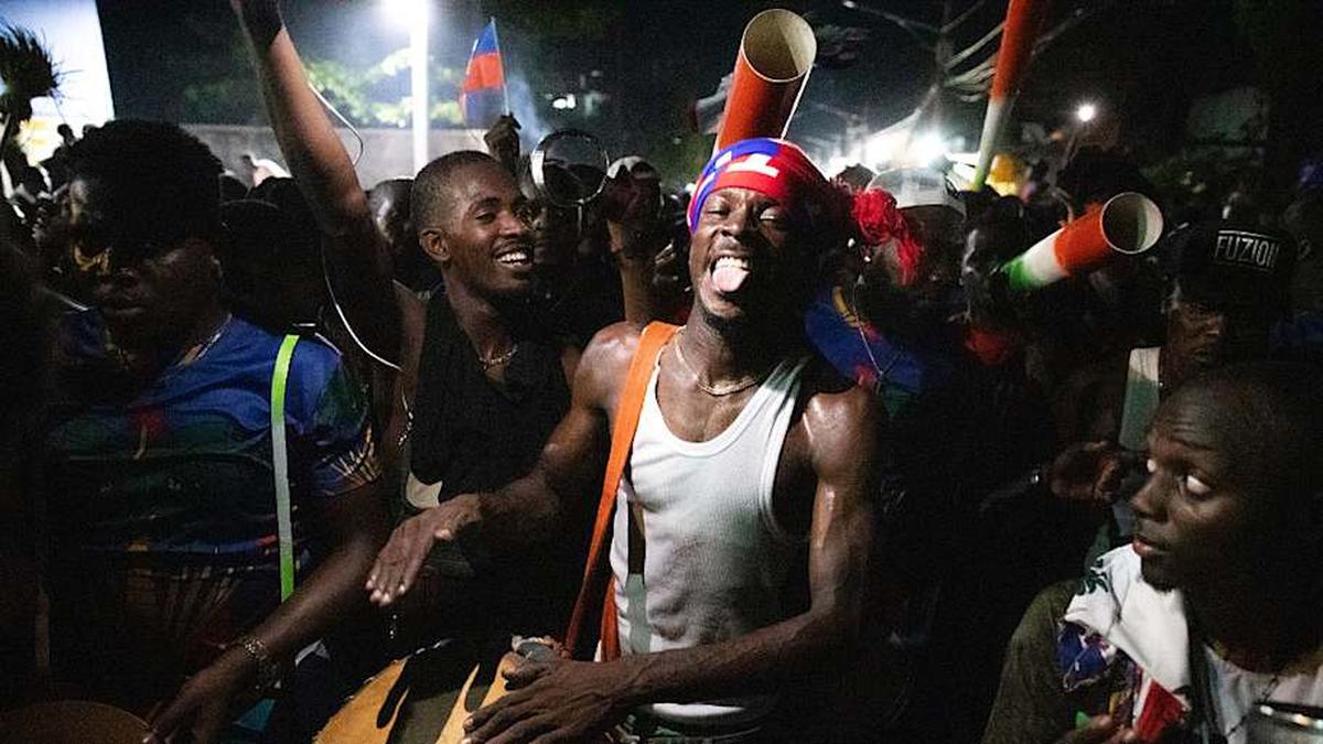  Fans took to the streets to celebrate Hati's return to the World Cup. | Clarens Siffroy/AFP/Getty Images 