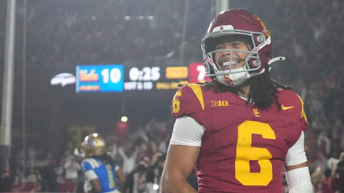  Nov 29, 2025; Los Angeles, California, USA; Southern California Trojans wide receiver Makai Lemon (6) celebrates after catching a 32-yard touchdown pass against the UCLA Bruins in the second half at United Airlines Field at Los Angeles Memorial Coliseum. Mandatory Credit: Kirby Lee-Imagn Images | Kirby Lee-Imagn Images 