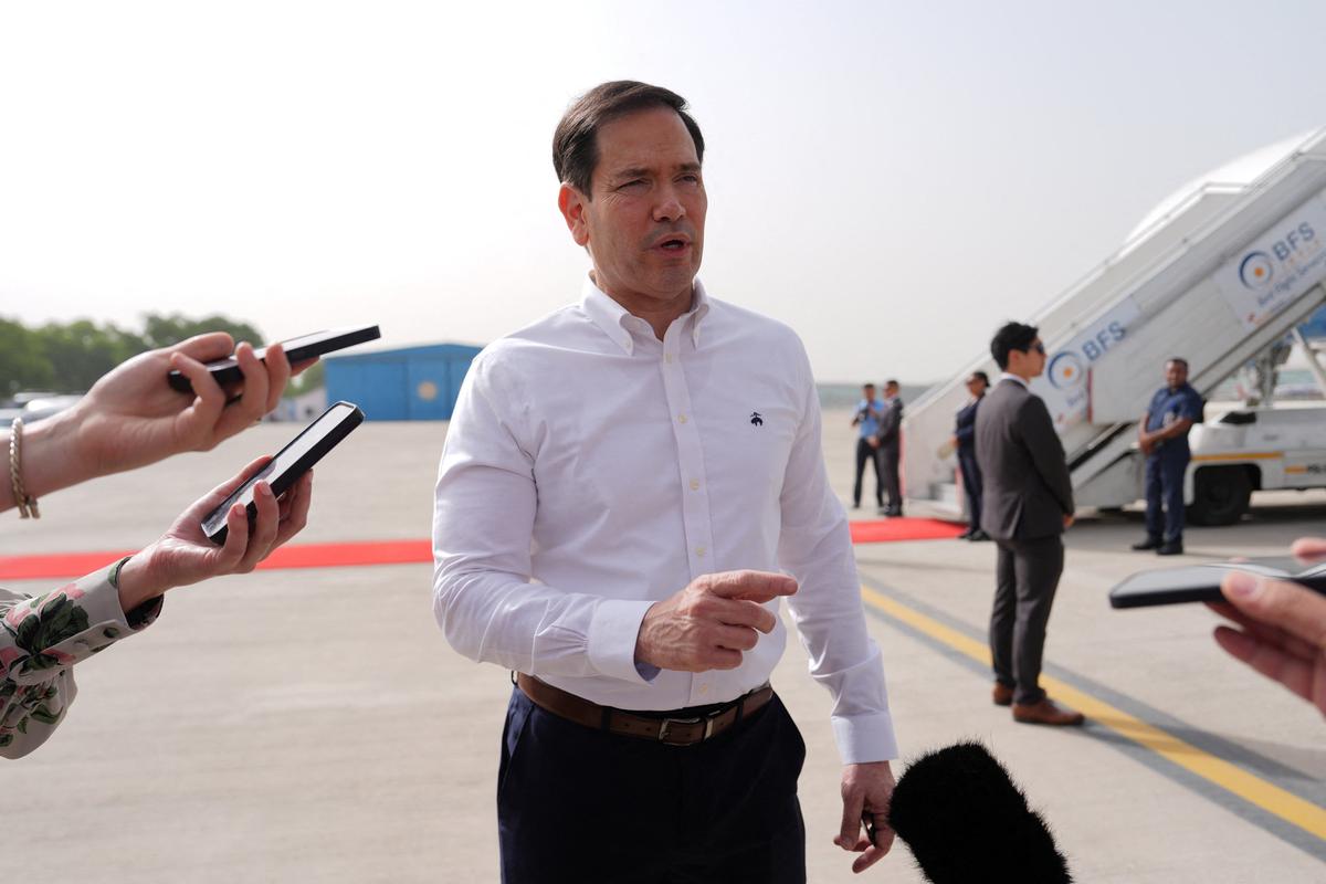 United States Secretary of State Marco Rubio speaks to the journalists before boarding his plane at Indira Gandhi International Airport in New Delhi, India, Monday, May 25, 2026.     Julia Demaree Nikhinson/Pool via REUTERS