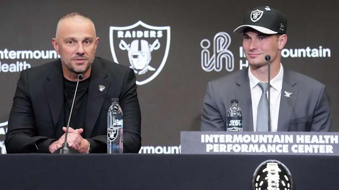  Apr 24, 2026; Henderson, NV, USA; Las Vegas Raiders quarterback Fernando Mendoza (right) and general manager John Spytek at introductory press conference at Intermountain Health Performance Center after being selected as the No. 1 pick in the 2026 NFL Draft. Mandatory Credit: Kirby Lee-Imagn Images | Kirby Lee-Imagn Images 