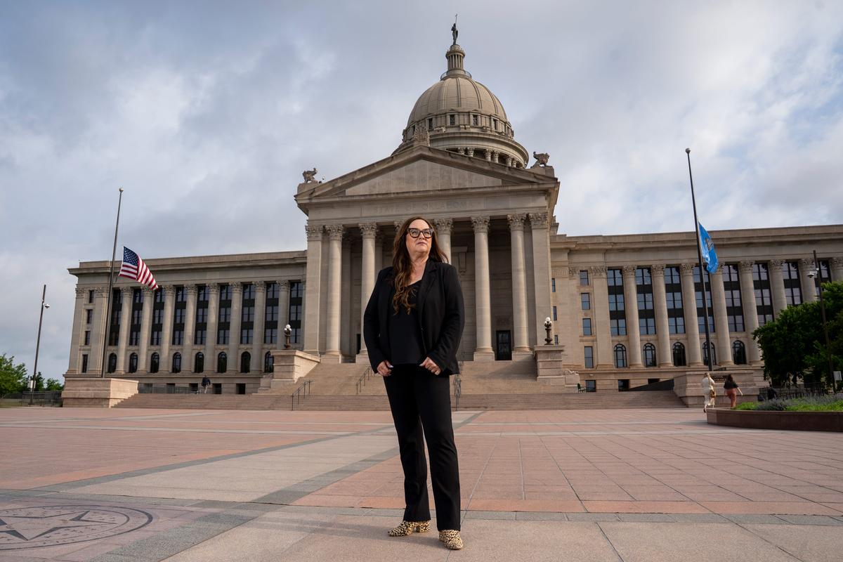  Erika Wright, director of the Oklahoma Rural Schools Coalition, at the Oklahoma State Capitol on Tuesday, April 14, 2026. Credit: Nick Oxford for The Hechinger Report