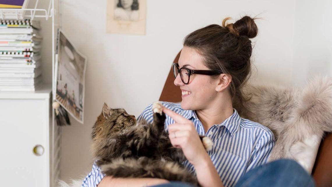 Cat Behaviorist Reveals the No. 1 Sign Your Cat Likes Cuddling 