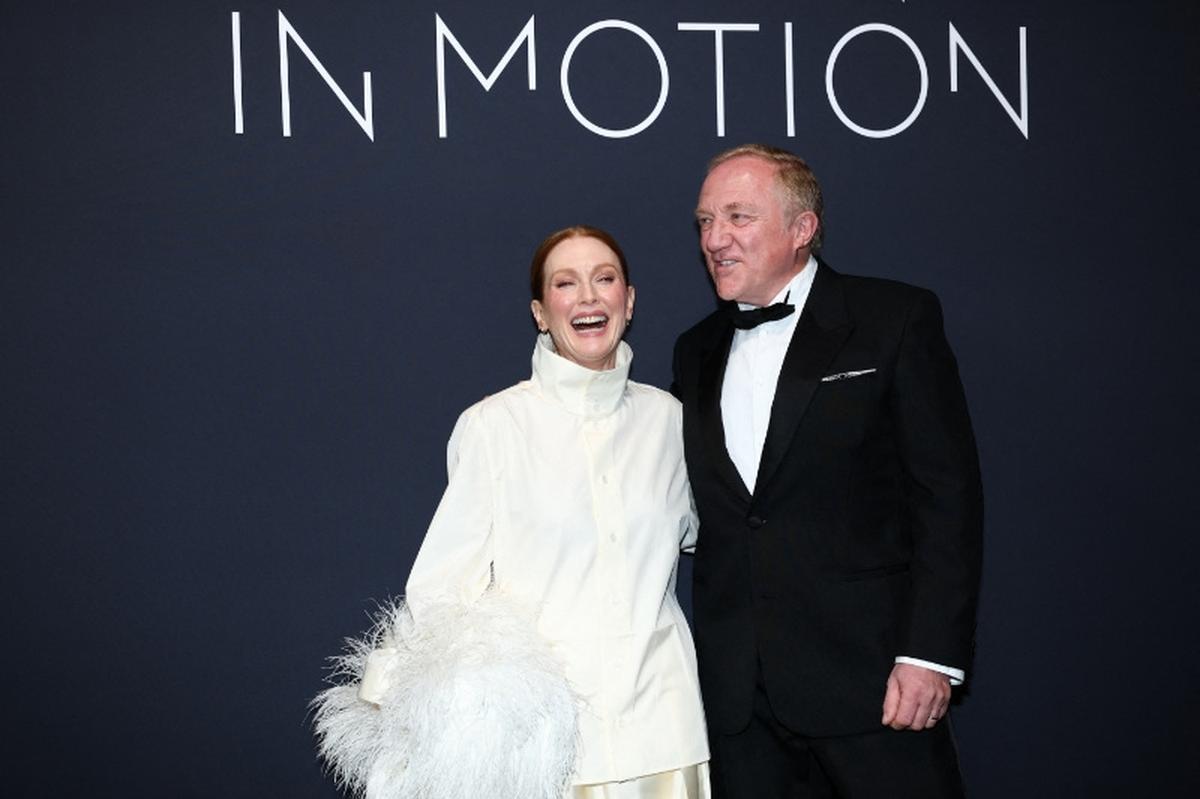 Julianne Moore and Francois-Henri Pinault pose during a photocall for the 2026 Kering's Women In Motion Awards and Cannes Film Festival Presidential Dinner as part of the 79th Cannes Film Festival in Cannes, France, May 17, 2026. REUTERS/Gonzalo Fuentes