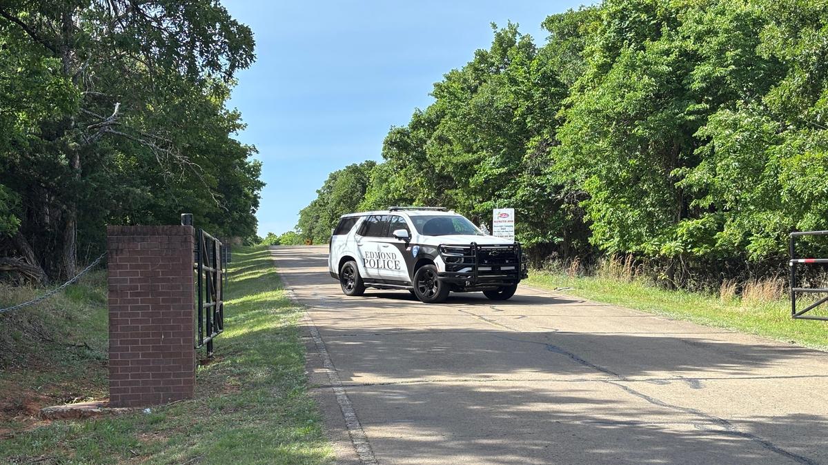 An Edmond police officer guards the entrance at the Scissortail Campground at Arcadia Lake, a day after a shooting at a party injured many at the facility near Edmond, Oklahoma, U.S. May 4, 2026.   Doug Hoke/USA Today Network via REUTERS.