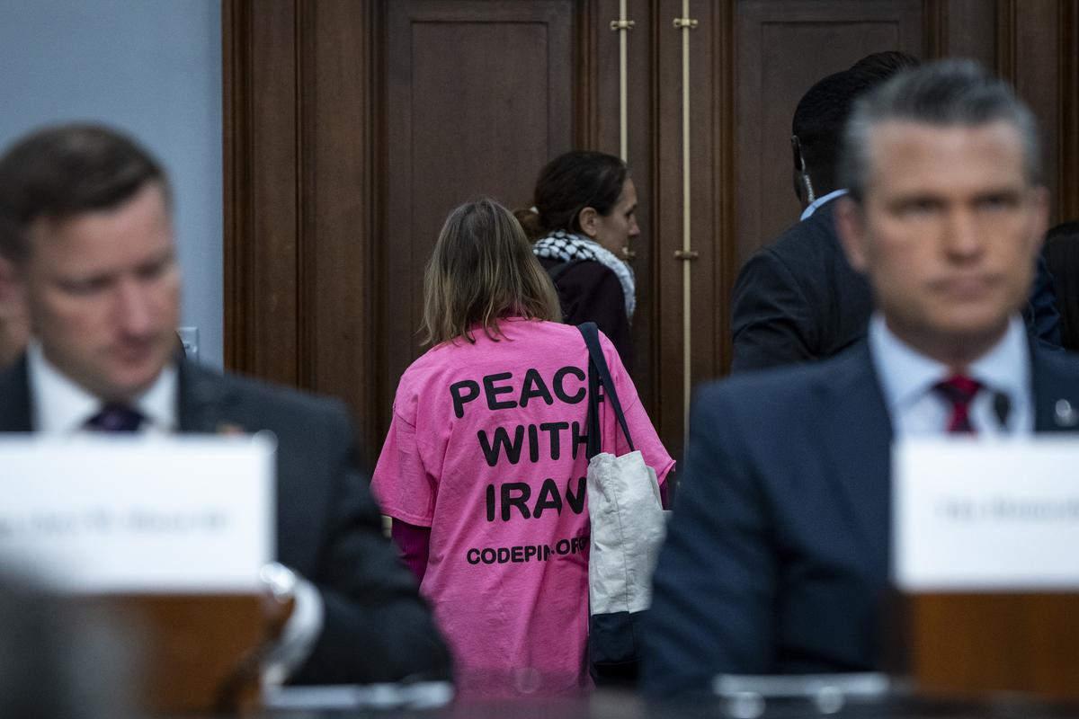 Medea Benjamin, founder of the anti-war group Code Pink, is led out of the room after demonstrating prior to the start of a hearing on the Department of Defense budget request before the House Appropriations subcommittee on defense in Washington, on Tuesday, May 12, 2026. (Haiyun Jiang/The New York Times)