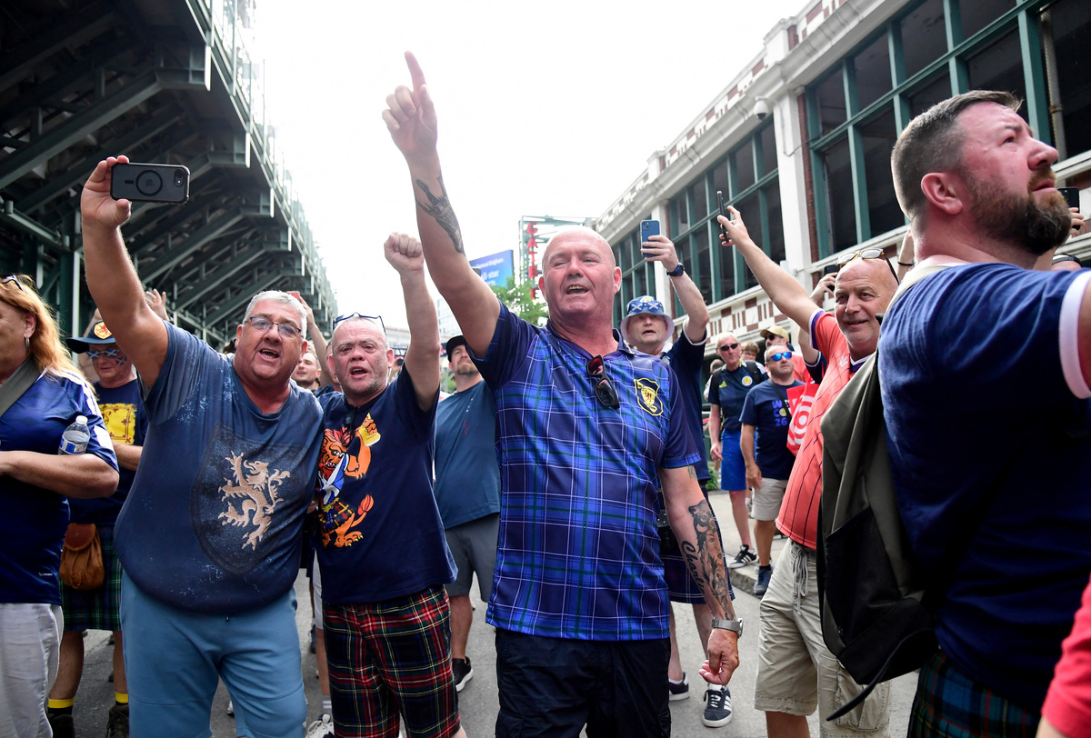 Soccer Football - FIFA World Cup 2026 - Scotland's Tartan Army march to Boston's Fenway Park baseball stadium - Boston, Massachusetts, U.S. - June 14, 2026 Scotland fans during the march to Fenway Park IMAGN IMAGES via Reuters/Bob Dechiara