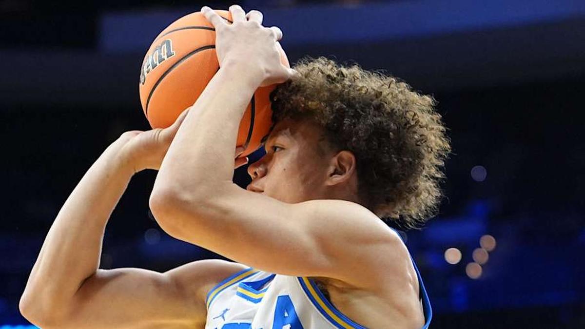  Mar 20, 2026; Philadelphia, PA, USA; UCLA Bruins guard Trent Perry (0) shoots the ball against the UCF Knights in the first half during a first round game of the men's 2026 NCAA Tournament at Xfinity Mobile Arena. Mandatory Credit: Kyle Ross-Imagn Images | Kyle Ross-Imagn Images 