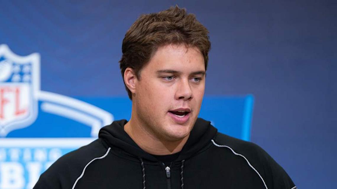  Feb 28, 2026; Indianapolis, IN, USA; Utah offensive lineman Caleb Lomu (OL33) speaks to members of the media during the NFL Combine at the Indiana Convention Center. Mandatory Credit: Jacob Musselman-Imagn Images | Jacob Musselman-Imagn Images 