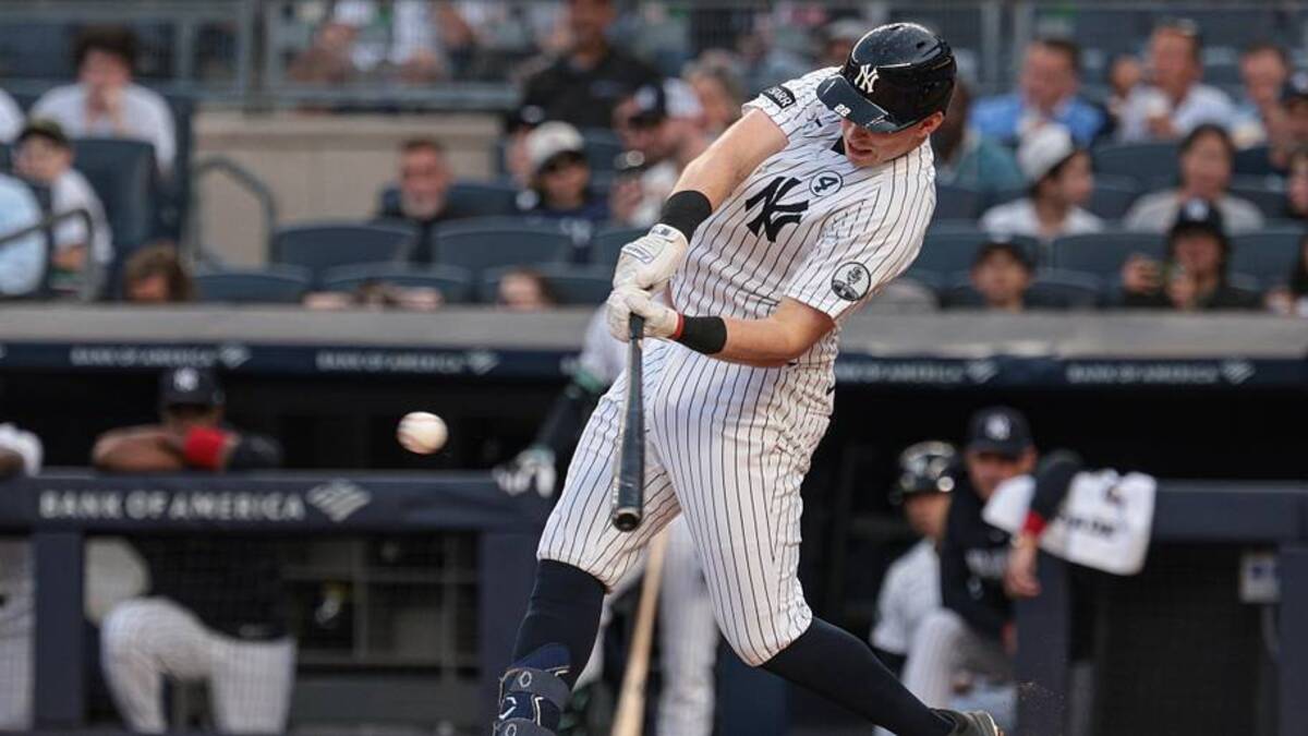  New York Yankees first baseman Ben Rice (22) singles during the third inning against the Cleveland Guardians at Yankee Stadium. | Vincent Carchietta-Imagn Images 