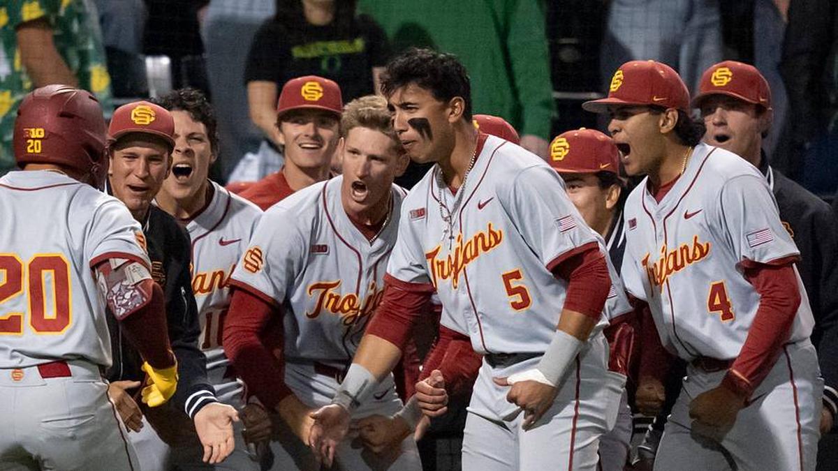  USC celebrates a home run by Isaac Cadena (20) as the Oregon Ducks host the USC Trojans on May 14, 2026, in Eugene, Oregon. | Ben Lonergan/The Register-Guard / USA TODAY NETWORK via Imagn Images 