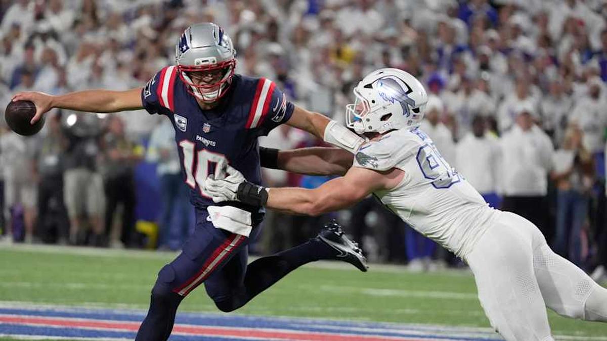  New England Patriots quarterback Drake Maye is forced out of bounds by Buffalo Bills defensive end Joey Bosa during second half action at Highmark Stadium in Orchard Park on Oct. 5, 2025. | Tina MacIntyre-Yee/Democrat and Chronicle / USA TODAY NETWORK via Imagn Images 