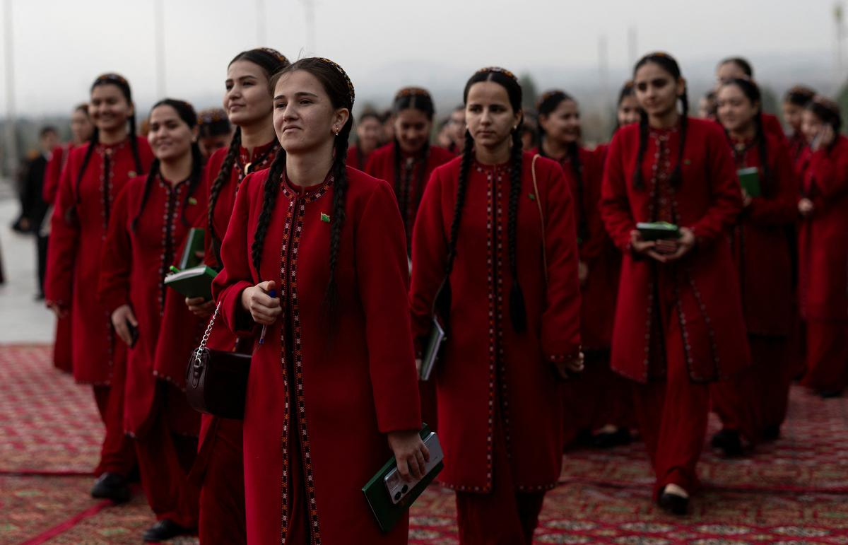 Students attend an opening ceremony of a trade fair in Ashgabat, Turkmenistan, March 17, 2026. REUTERS/Umit Bektas