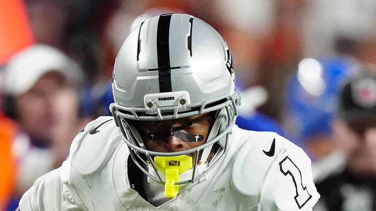  Nov 6, 2025; Denver, Colorado, USA; Las Vegas Raiders wide receiver Tre Tucker (1) runs with the ball after catch against the Denver Broncos during the first half at Empower Field at Mile High. Mandatory Credit: Ron Chenoy-Imagn Images | Ron Chenoy-Imagn Images 