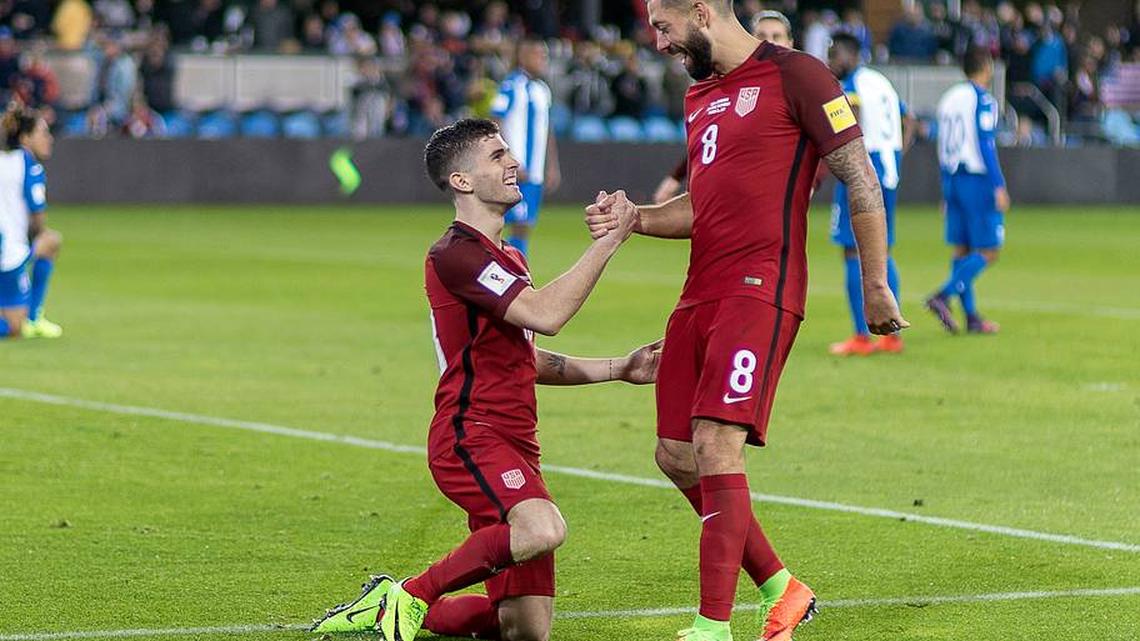  Christian Pulisic (left) played several games in his early national team career with Clint Dempsey (right) | Robin Alam/Icon Sportswire/Getty Images 