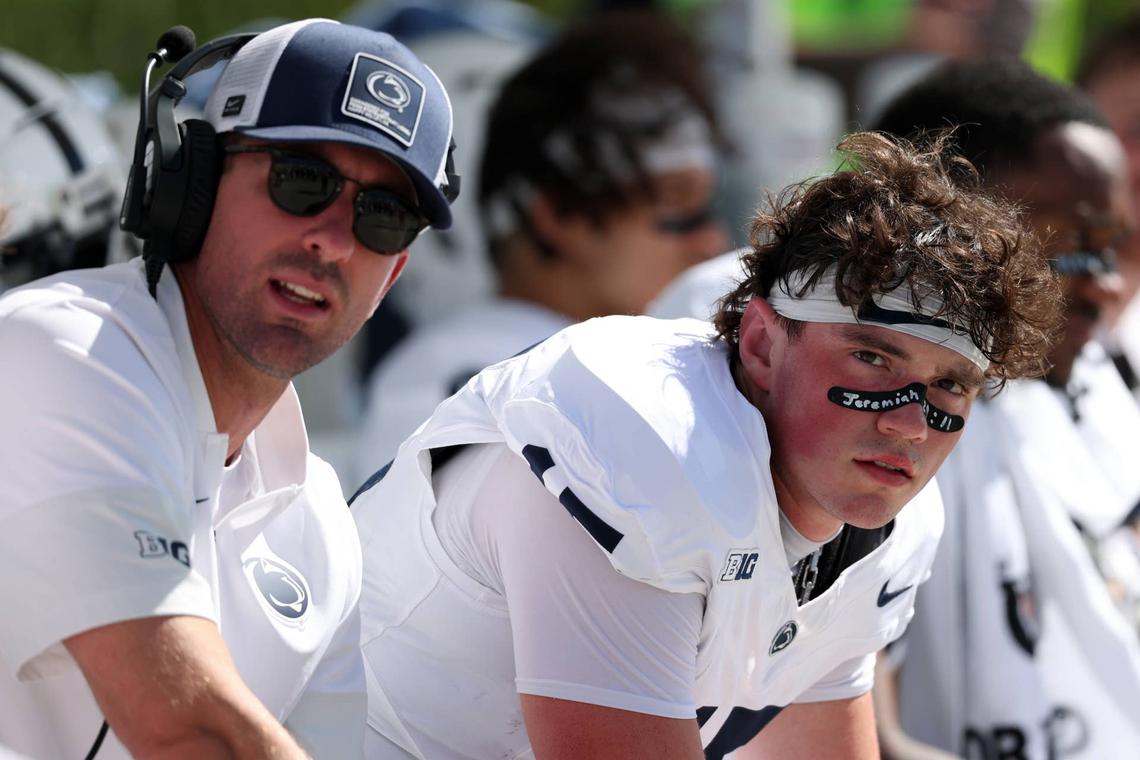  Penn State Nittany Lions quarterback Drew Allar (15, right) 