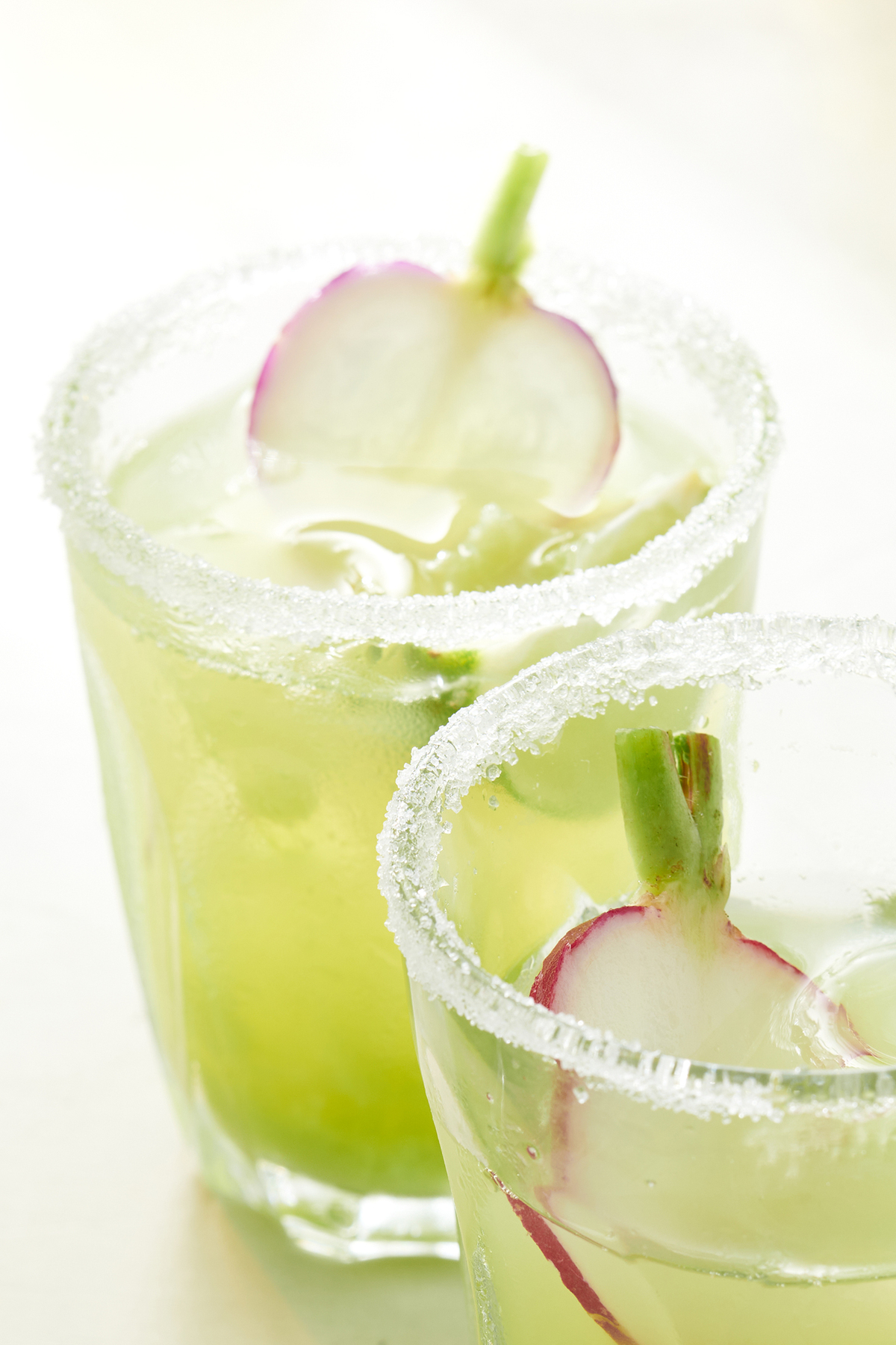Cucumber-apple cooler. A little ginger and cayenne add heat to this cooling nonalcoholic drink. Food styled by Cyd Raftus McDowell. (David Malosh/The New York Times)