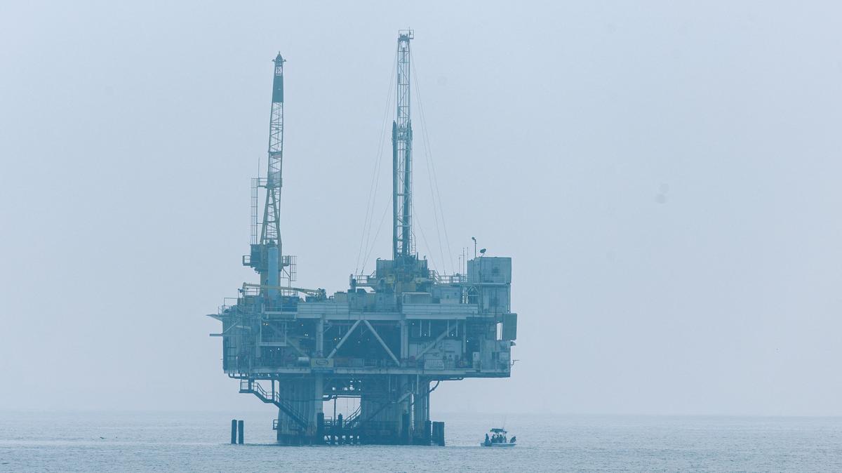 An offshore oil rig platform off the coast of California from Seal Beach, California, U.S., November 11, 2025.  REUTERS/Mike Blake/File Photo