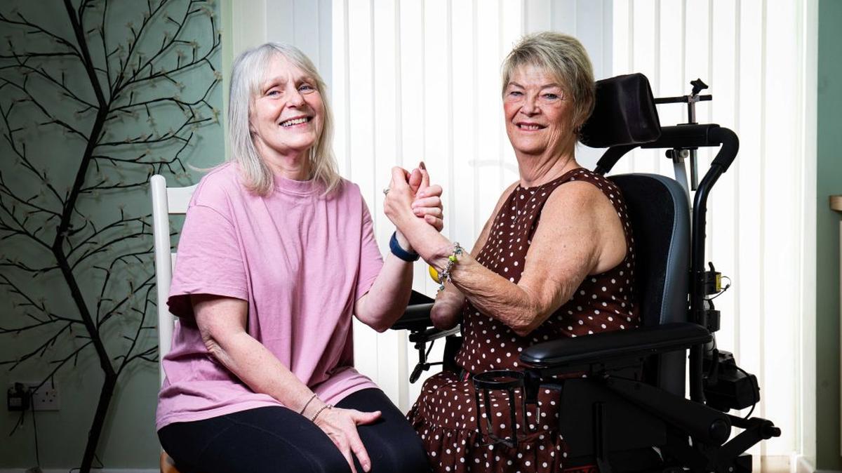 Jackie Kirwan met Kim Smith, who received Georgie's hand during a transplant. (William Lailey via SWNS). 