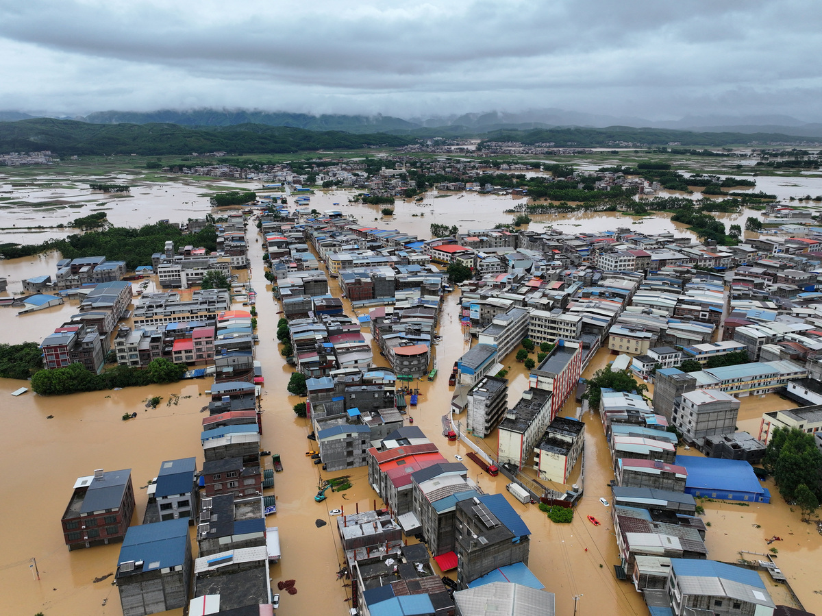 A drone view shows flooding in Pingshan village after heavy rainfall brought by Typhoon Maysak, in Hengzhou, Guangxi Zhuang Autonomous Region, China July 6, 2026. cnsphoto via REUTERS