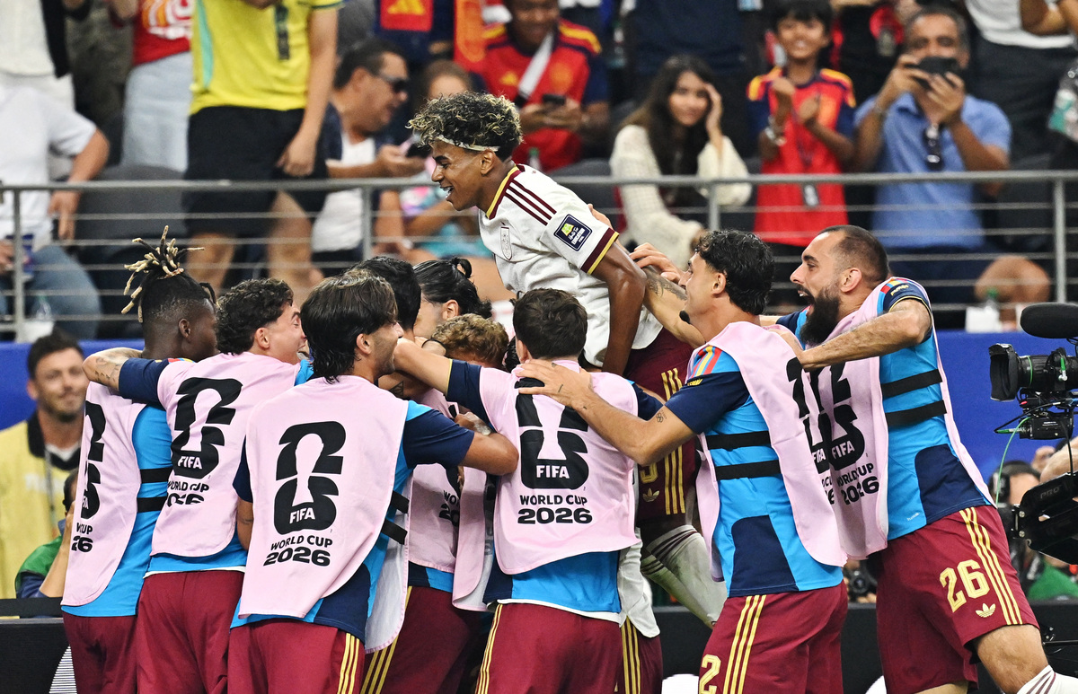 Soccer Football - FIFA World Cup 2026 - Semi Final - France v Spain - Dallas Stadium, Arlington, Texas, U.S. - July 14, 2026 Spain's Lamine Yamal and teammates celebrate after Pedro Porro scores their second goal IMAGN IMAGES via Reuters/Maria Lysaker