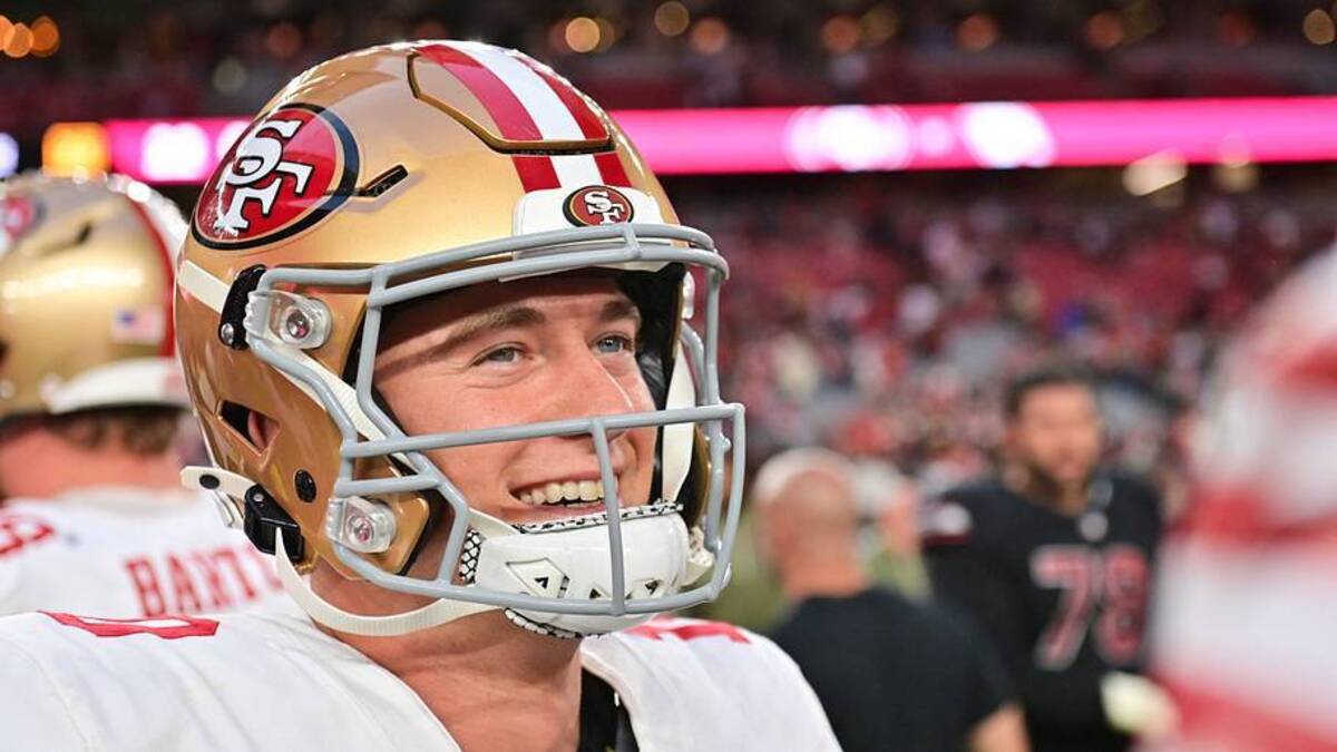  Nov 16, 2025; Glendale, Arizona, USA; San Francisco 49ers quarterback Mac Jones (10) looks on after defeating the Arizona Cardinals at State Farm Stadium. Mandatory Credit: Matt Kartozian-Imagn Images | IMAGN IMAGES via Reuters Connect 