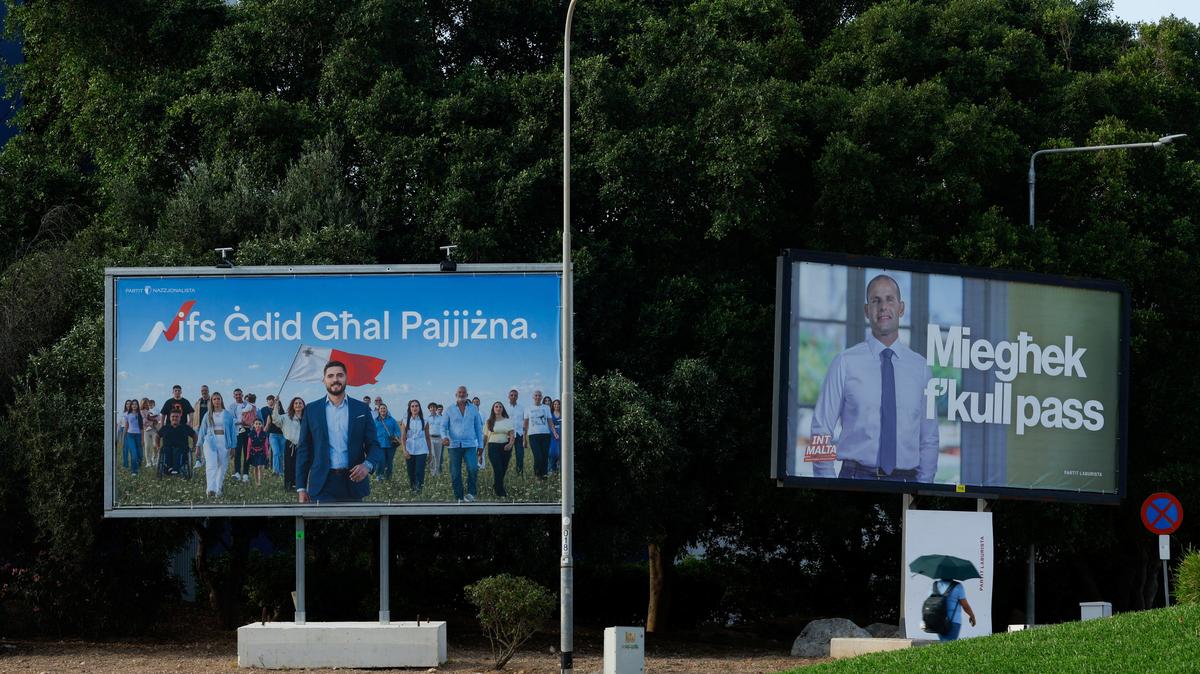 Billboards showing opposition and Nationalist Party leader Alex Borg and Malta's Prime Minister and Labour Party leader Robert Abela ahead of general elections, in Birkirkara, Malta, May 29, 2026. REUTERS/Darrin Zammit Lupi