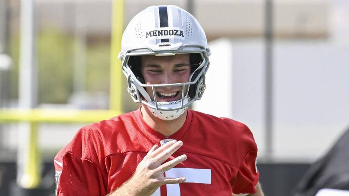  Jun 3, 2026; Henderson, NV, USA; Las Vegas Raiders quarterback Fernando Mendoza (15) warms up during organized team activities at Intermountain Health Performance Center. Mandatory Credit: Candice Ward-Imagn Images | Candice Ward-Imagn Images 