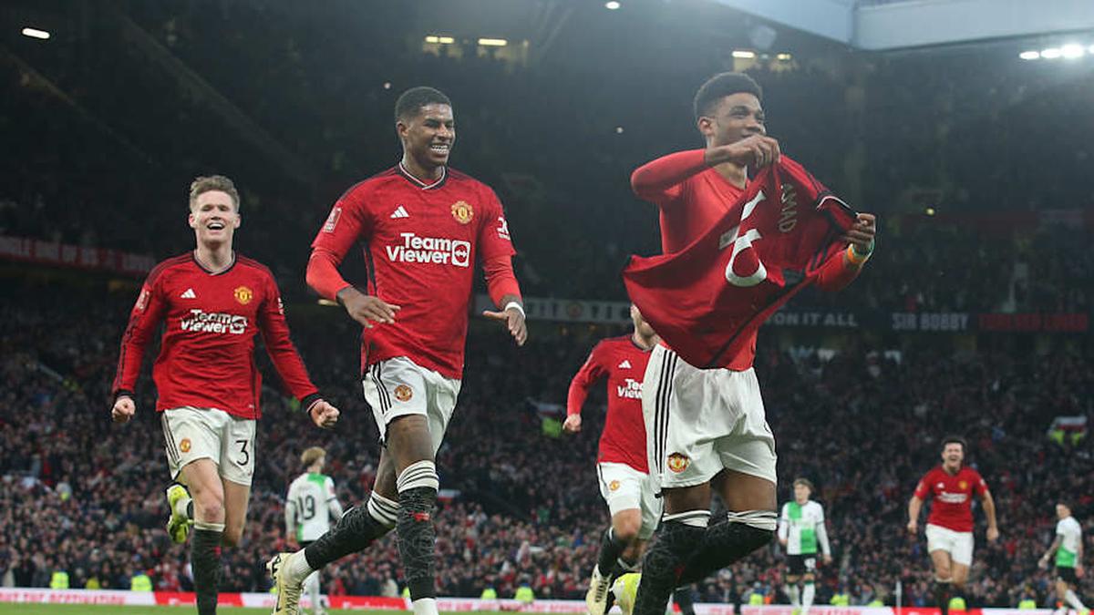  Amad Diallo (right) would soon regret his celebration. | Matthew Peters/Manchester United/Getty Images 