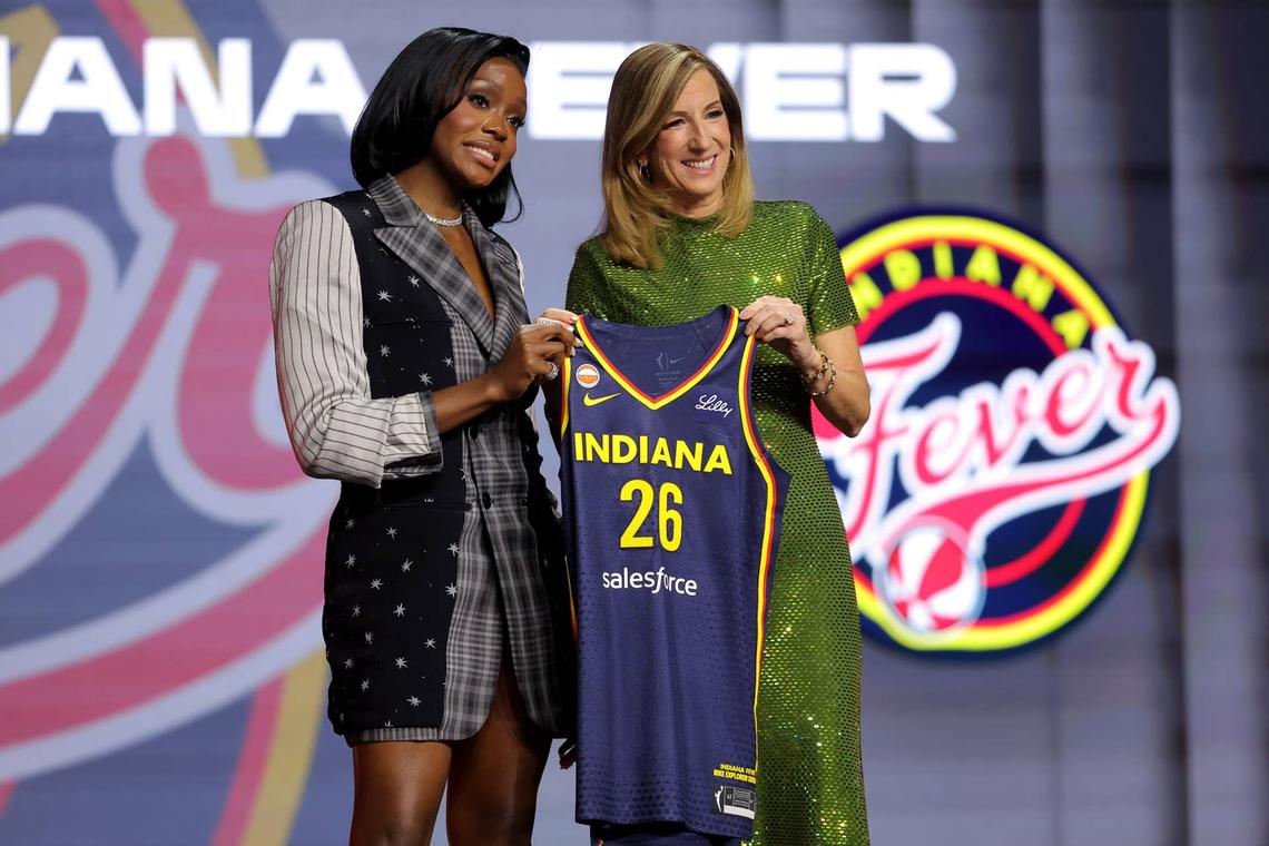  WNBA Commissioner Cathy Engelbert poses for photos with Raven Johnson who was selected tenth overall by the Indiana Fever during the 2026 WNBA Draft. Brad Penner-Imagn Images