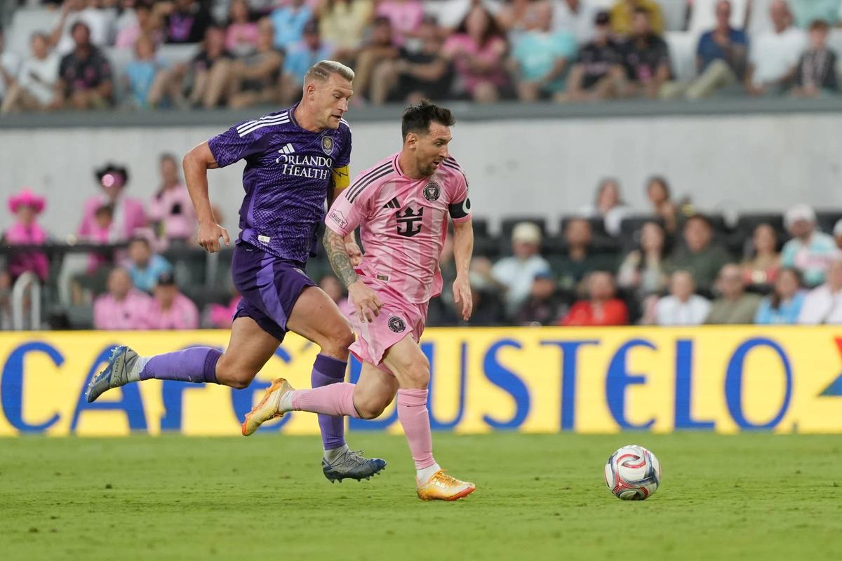  Lionel Messi runs with the ball whilst under pressure from Robin Jansson during the MLS match between Inter Miami CF and Orlando City SC. Photo by Calvin Hernandez/Getty Images