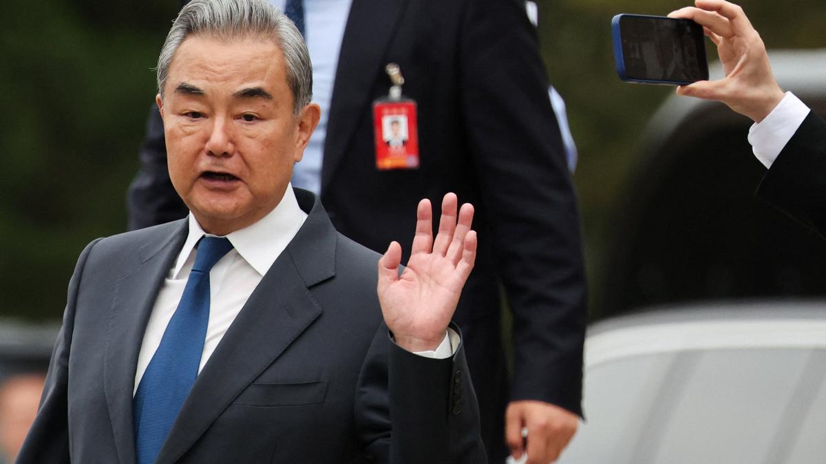 Chinese Foreign Minister Wang Yi leaves the Great Hall of the People in Beijing during Russian President Vladimir Putin visit to China, May 20, 2026. REUTERS/Maxim Shemetov/Pool