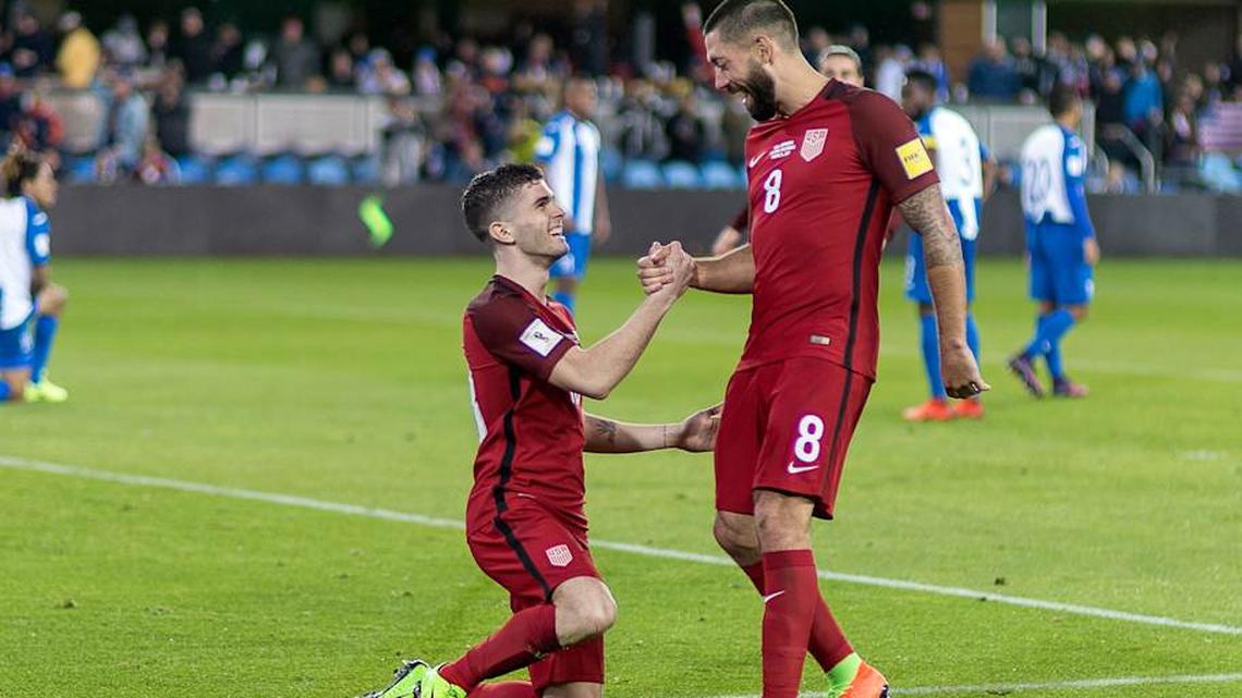  Christian Pulisic (left) played several games in his early national team career with Clint Dempsey (right) | Robin Alam/Icon Sportswire/Getty Images 