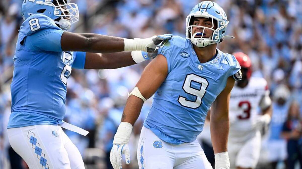  Sep 13, 2025; Chapel Hill, North Carolina, USA; North Carolina Tar Heels defensive lineman Melkart Abou-Jaoude (9 ) celebrates with defensive lineman Smith Vilbert (8) after making a sack in the first quarter at Kenan Stadium. Mandatory Credit: Bob Donnan-Imagn Images | IMAGN IMAGES via Reuters Connect 