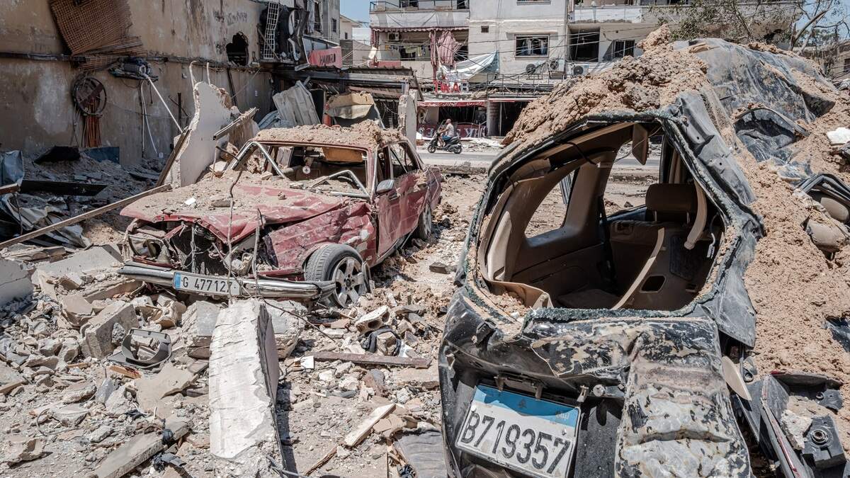 A man on a scooter rides past the wreckage left by Israeli airstrikes in the southern port city of Tyre, Lebanon, on Friday, June 12, 2026. Israel continued to pound Lebanon with airtsrikes on Friday, as the enduring conflict with Hezbollah showed few signs of letting up despite President Donald Trump’s claim of diplomatic progress with Tehran. (Daniel Berehulak/The New York Times)
