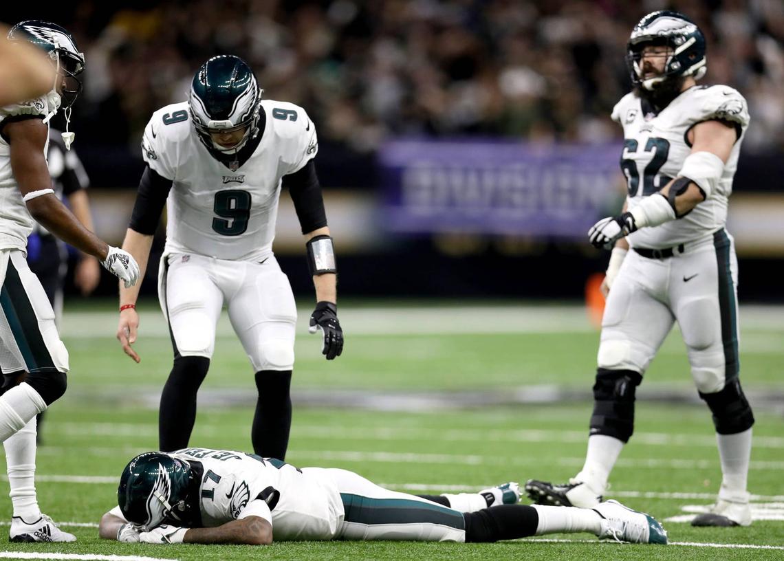  NEW ORLEANS, LOUISIANA - JANUARY 13: Alshon Jeffery #17 of the Philadelphia Eagles is consoled by Nick Foles #9 after allowing a pass to go through his hands that led to an interception late in the fourth quarter against the New Orleans Saints in the NFC Divisional Playoff Game at Mercedes Benz Superdome on January 13, 2019 in New Orleans, Louisiana. The Saints defeated the Eagles 20-14. (Photo by Chris Graythen/Getty Images) 