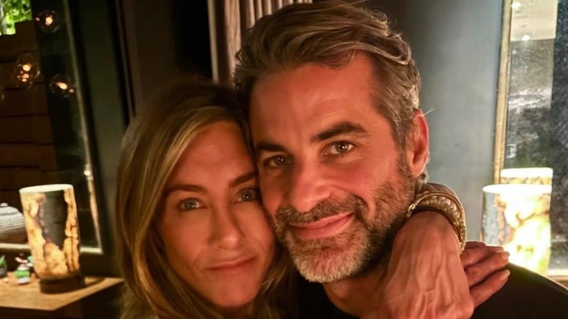 Jennifer Aniston Cuddles Up With Boyfriend Jim Curtis in New Photos 